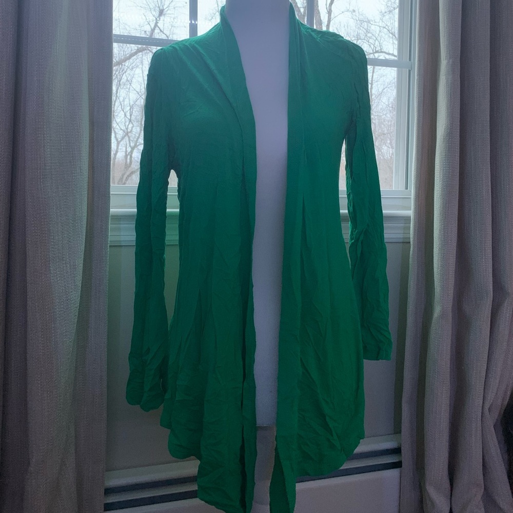 A cute green cardigan.